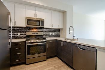 Slate stainless steel appliances in select homes